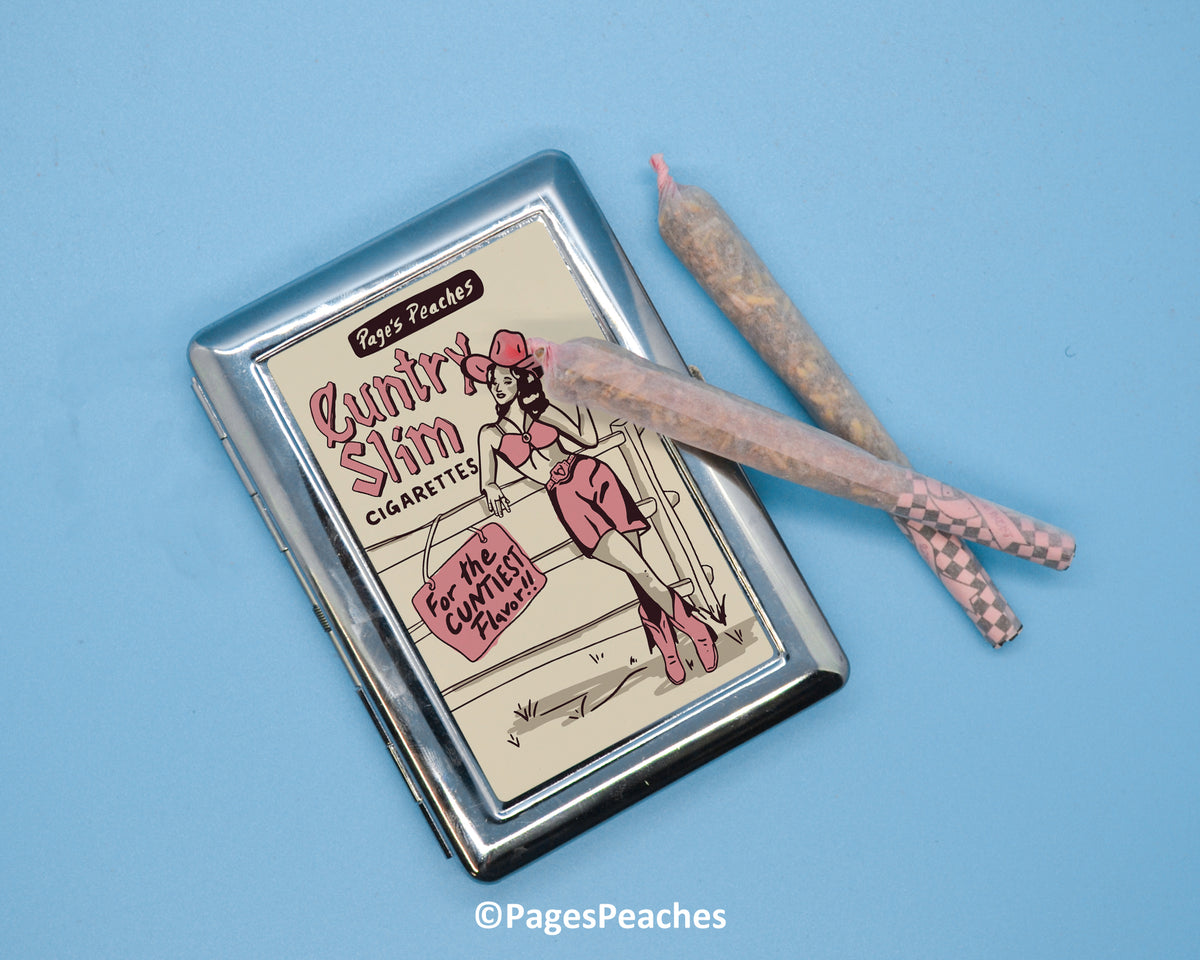 a cigarette case with a cigarette next to it