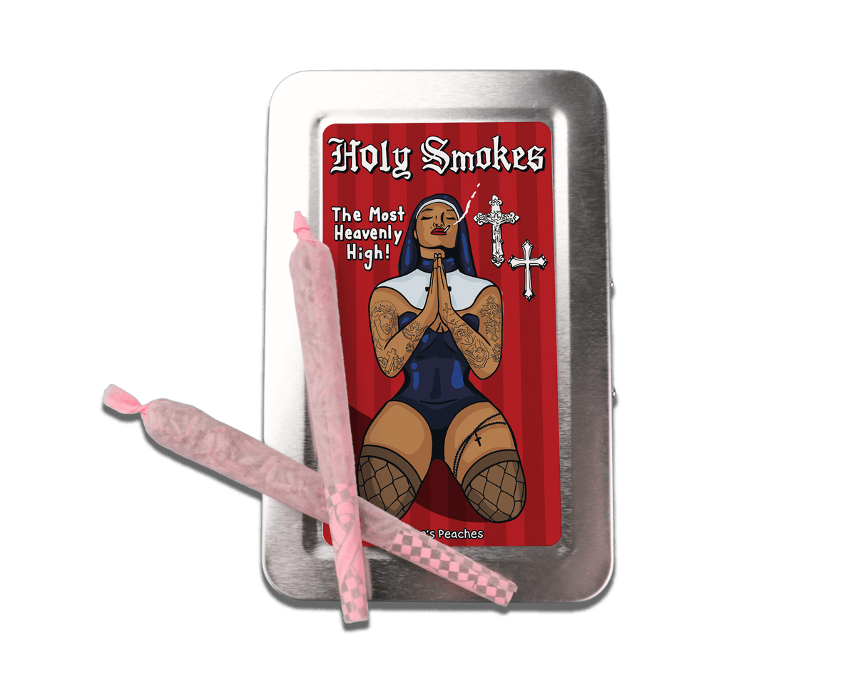 a tin with a cigarette in it and a cigarette holder