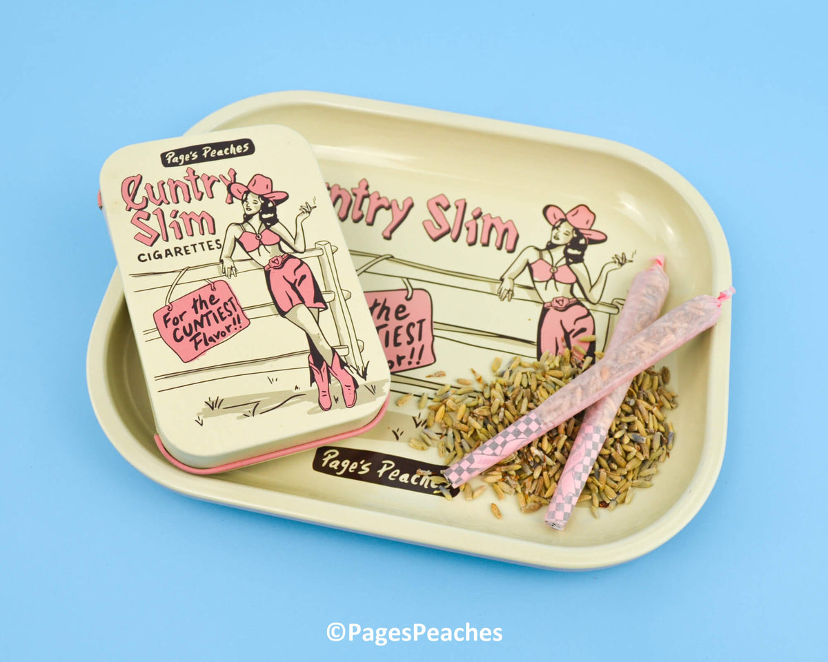 Metal tray with cowgirl art styled like vintage cigarette branding