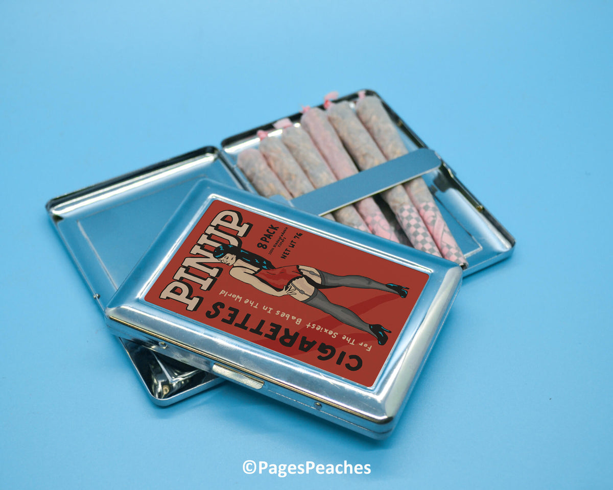 two tins of cigarettes sitting on top of each other