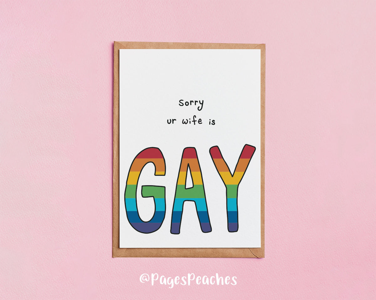 A card that says sorry your wife is gay with gay in a rainbow that is for a lesbian wedding gift
