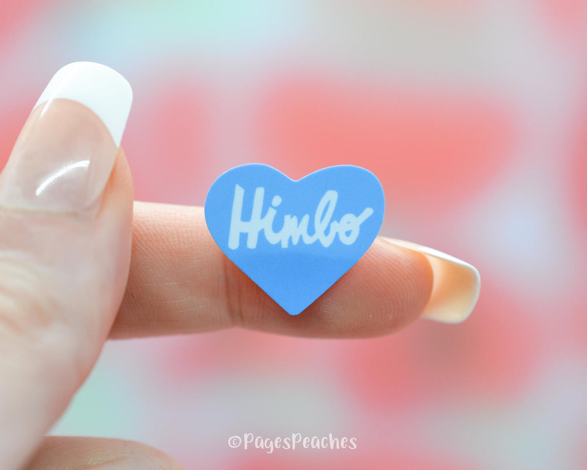 Small blue heart sticker that says himbo