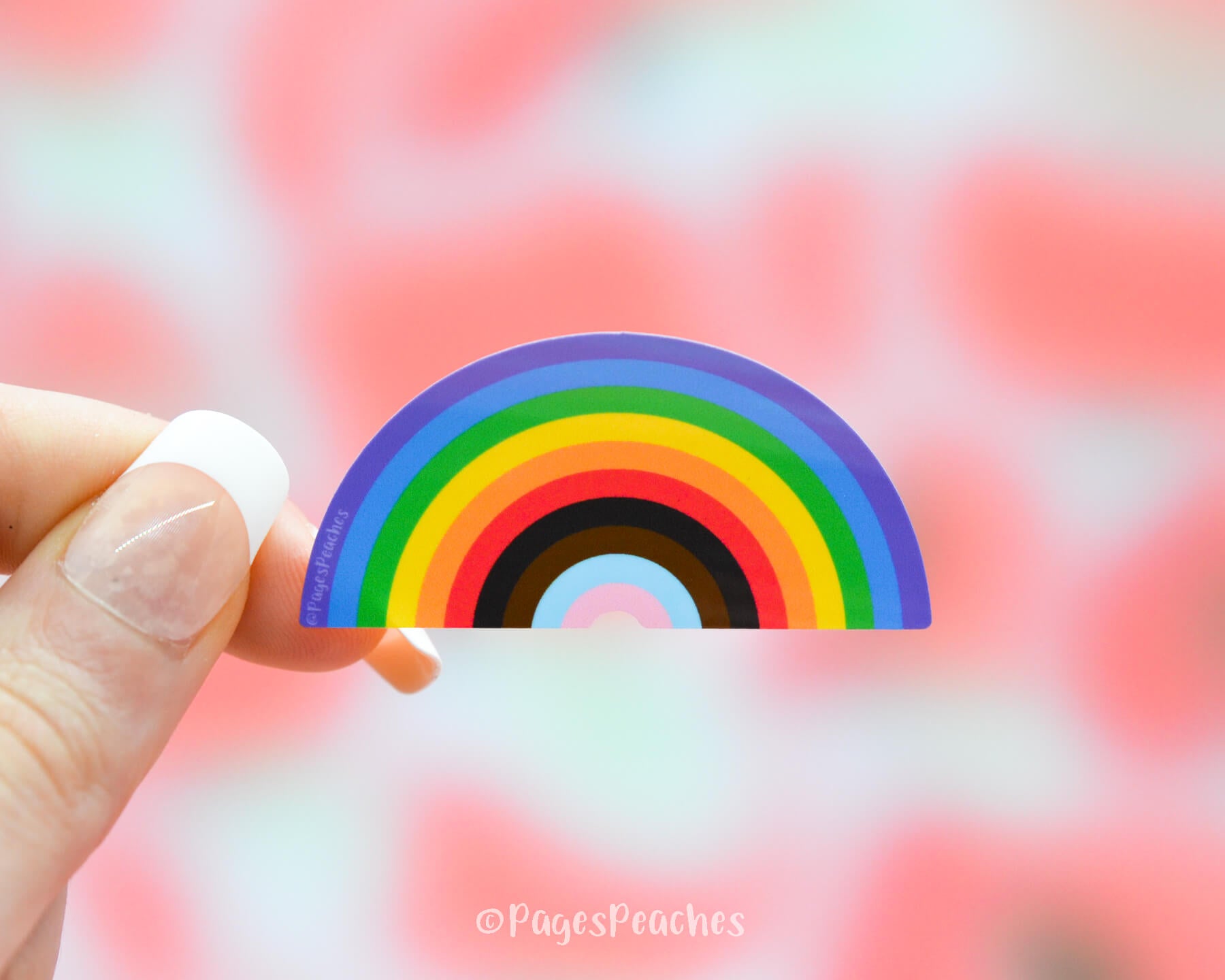 Sticker of a rainbow with inclusive progress pride colors for LGBTQ