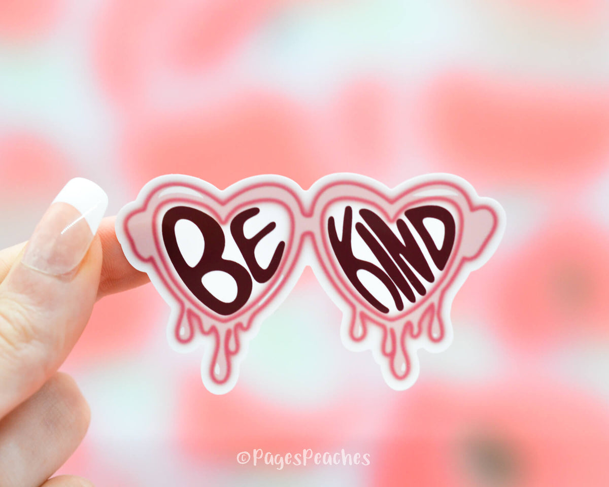 Sticker of Pink Heart Shaped Glasses that are melting that says Be Kind like Harry Styles TPWK