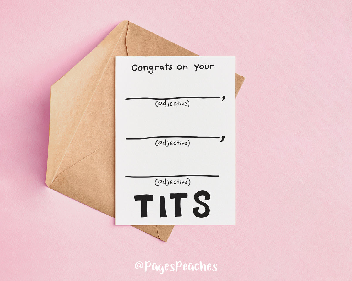A congratulations card that says congrats on your (insert adjectives) tits on top of a kraft envelope to celebrate a boob job or top surgery